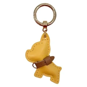 DARK Puppy Bag Charm Yellow v:2324556 DARK Puppy Bag Charm Yellow v:2324556